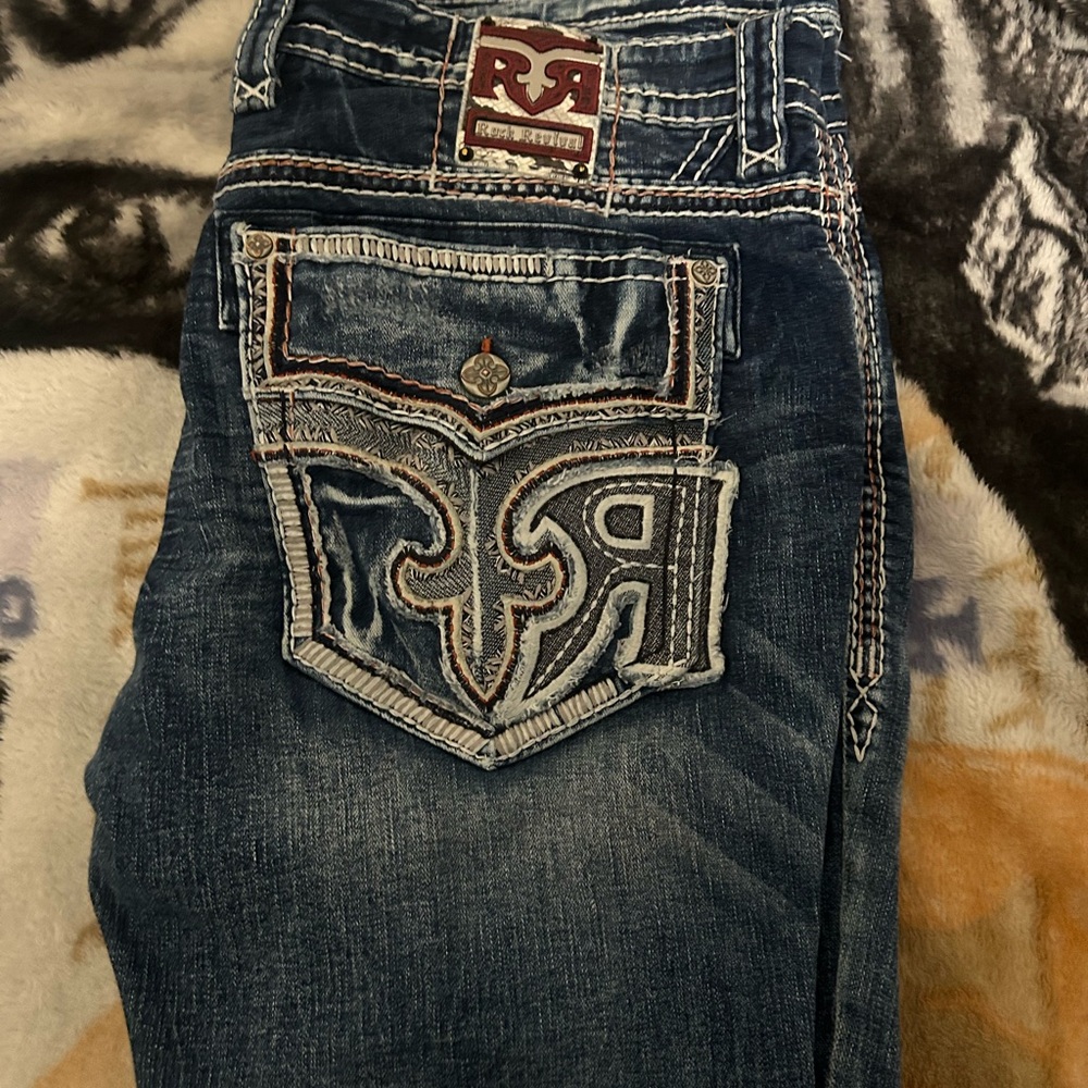 Rock Revival Distressed Blue Jeans with Embroidered Pockets